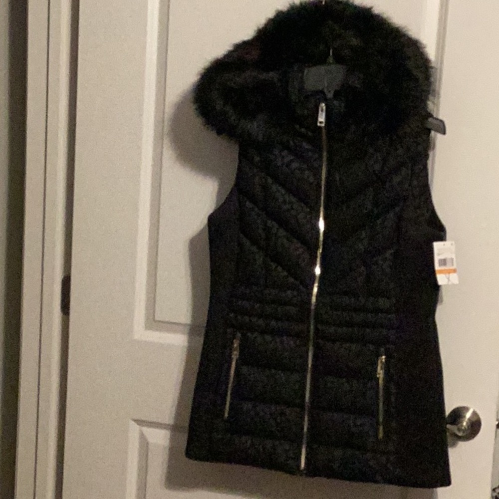 Michael Kors black quilted faux fur detachable hoodie zip up vest.